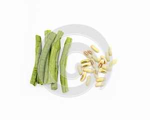 fresh green yardlong bean with seeds pieces isolated on white background