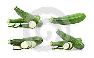 Fresh green zucchini with slice on white background