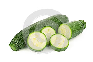 Fresh green zucchini with slices isolated on white