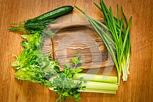 Fresh greens and rustic wooden dish