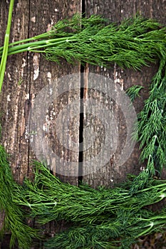 Fresh greens on   wooden table