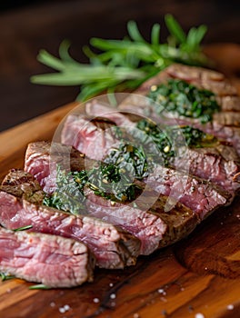 Fresh grilled meat. Juicy medium-rare beef steak with herbs