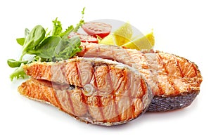 Fresh grilled salmon steak slices