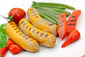 Fresh grilled sausages with red bell pepper