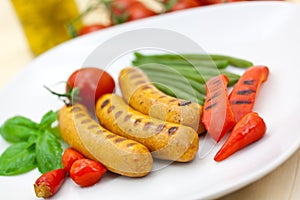 Fresh grilled sausages with red bell pepper