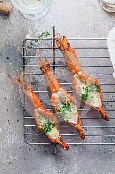 Fresh grilled shrimps served with sauce and crusty bread