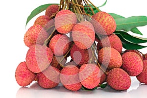 fresh group red lychee sweet fruits with green leaf. Isolated on white background. circle surface grunge texture