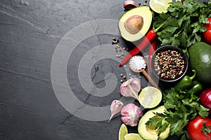 Fresh guacamole ingredients on table, flat lay. Space for text