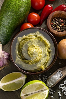 Fresh guacamole sauce and ingredients