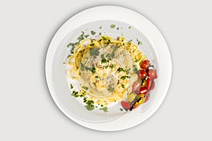 Fresh handmade tagliatelle pasta with forest mushrooms, parsley and cherry tomatoes salad