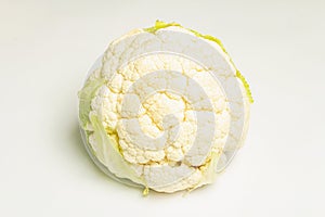 A fresh head of cauliflower isolated on white background