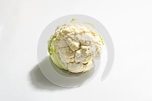 A fresh head of cauliflower isolated on white background