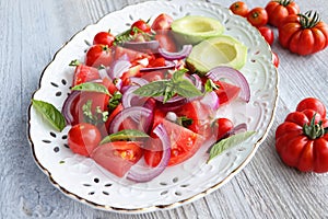 Fresh healthy Avacado and Tomato Salad with Onions