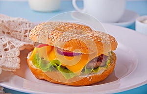 Fresh healthy bagel sandwich on a white plate
