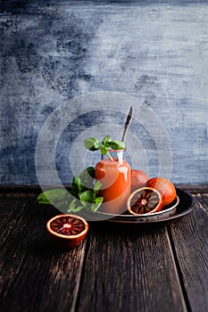 Fresh healthy blood oranges juice in glass