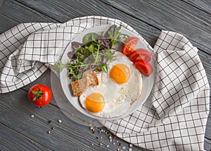 Fresh healthy breakfast eggs and salad