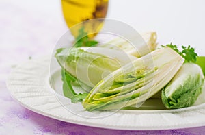 Fresh and healthy Chicory witloof Salad on a plate.