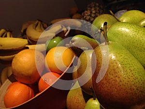 Fresh, healthy Fruit heaped in Bowls photo
