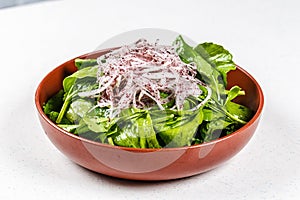 Fresh healthy garden salad on brown plate