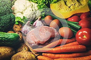 Fresh healthy organic food from local farmer- group of vegetables, meat and eggs