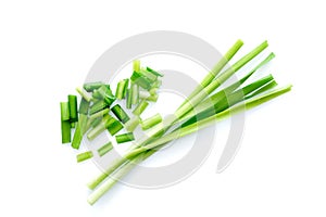 Fresh healthy organic green vegetable garlic chives, chinese chive sliced, green herb isolated on white background