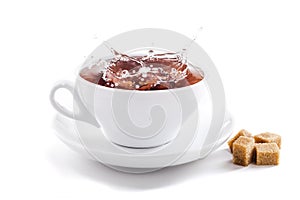 Fresh healthy tea splash in a tea-cup