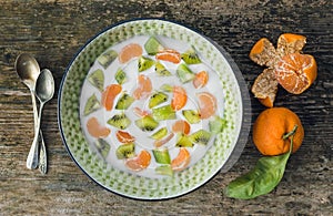 Fresh and healthy vegetarian breakfast set: a bawl of yogurt wit photo