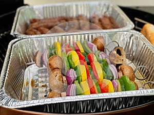 Fresh healthy veggie kabobs cooking on the grill