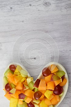 Fresh Heart Healthy Fruit Salad with Lots of Copy Space. Contains Grapes, Canteloupe, Honeydew Melons, Pineapple and Apples.