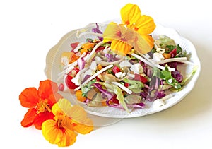 Fresh and heathy salad with nasturtiums photo
