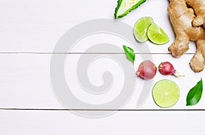 Fresh herbs and spices green leaf on white wooden table background