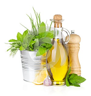 Fresh herbs, spices, olive oil and pepper shaker
