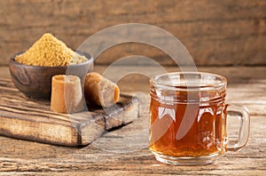 Fresh homemade Aguapanela, Agua de Panela or Aguadulce, a popular Latin American sweet drink made of panela unrefined whole cane photo