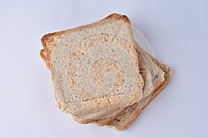 Fresh homemade baked bread and sliced bread isolated on white background