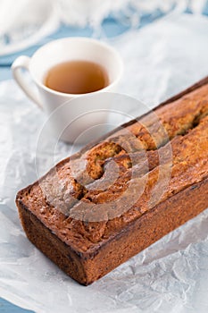 Fresh homemade banana bread, with cup of tea