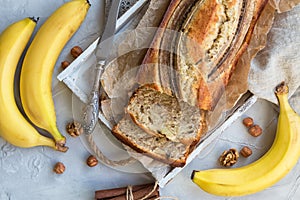 Fresh homemade banana bread with ingredients