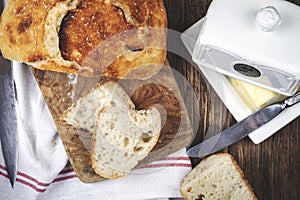 Fresh homemade bread on kitchen table close-up