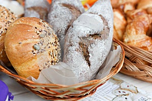 Fresh homemade bread loafs in basket