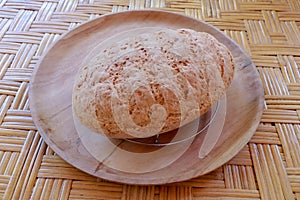 Fresh homemade bread made of wheat and rye flour. Sliced bread in a wicker basket. Fresh homemade bread made of wheat and rye flou