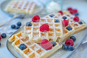 Fresh homemade brussels waffles with berries