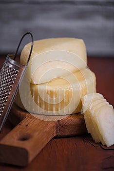 Fresh homemade cheesehead on wooden board