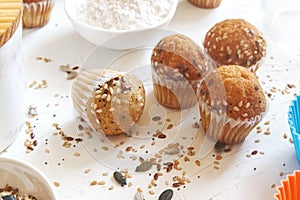 Fresh homemade delicious wholegrain cupcakes and muffins. Natural light and empty copy space