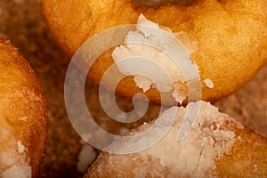 Fresh homemade doughnuts with powdered sugar. Close-up Selective focus