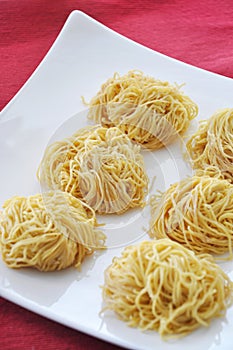 Fresh Homemade Egg Noodles on White Plate