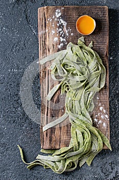Fresh homemade green pasta tagliatelle