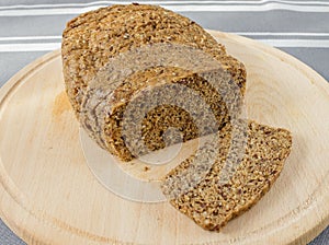 Fresh homemade keto bread on wooden background