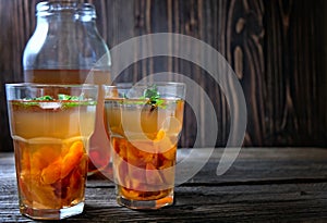 Fresh Homemade Peach Sweet Tea with Mint