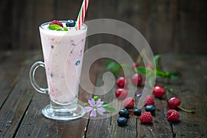 Fresh homemade smoothie with blueberries, raspberries and sour cherries