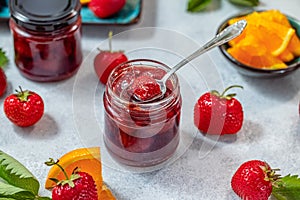 Fresh homemade strawberry jam with orange