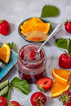 Fresh homemade strawberry jam with orange